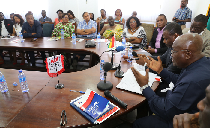  Nana Akufo-Addo (right), the Presidential Candidate of the NPP, interacting with members of the Association of Ghana Industries (AGI) in Accra.  Picture: SAMUEL TEI ADANO